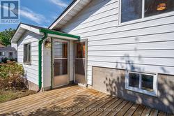 REAR ENTRANCE TO HOUSE AND GARAGE -