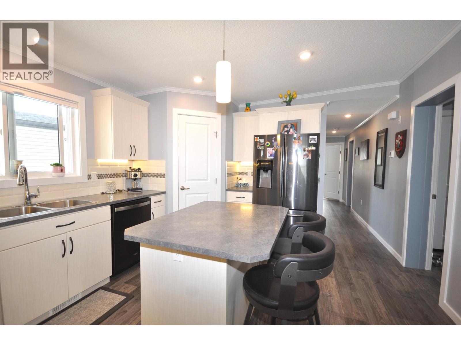 31 4072 Lac La Hache Station Road, Lac La Hache, BC - Indoor Photo Showing Kitchen With Double Sink