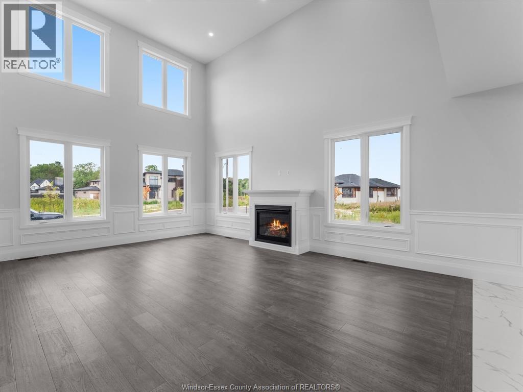 3573 Fiorina, Lasalle, ON - Indoor Photo Showing Living Room With Fireplace