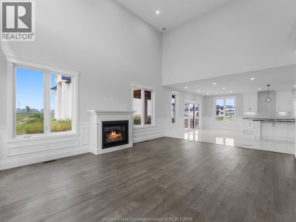 3573 Fiorina, Lasalle, ON - Indoor Photo Showing Other Room With Fireplace