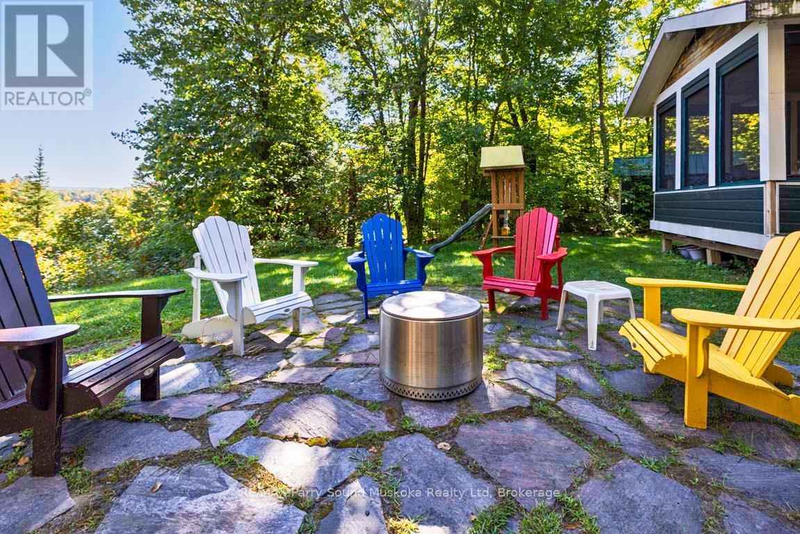 Firepit area great for family memories - 78 Captain Estates Road, Whitestone (Hagerman), ON - Outdoor With Deck Patio Veranda