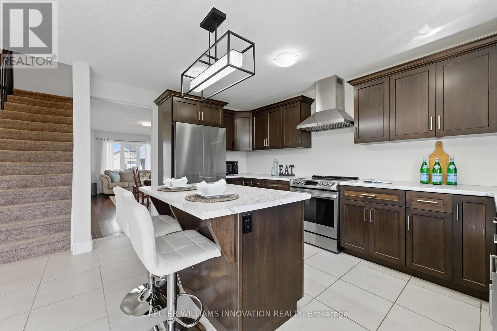 97 Forbes Crescent, North Perth, ON - Indoor Photo Showing Kitchen With Stainless Steel Kitchen With Double Sink With Upgraded Kitchen