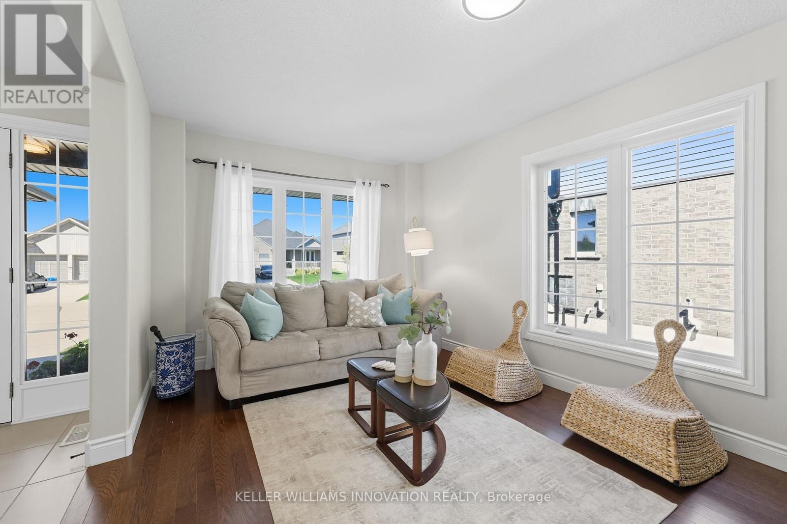 97 Forbes Crescent, North Perth, ON - Indoor Photo Showing Living Room