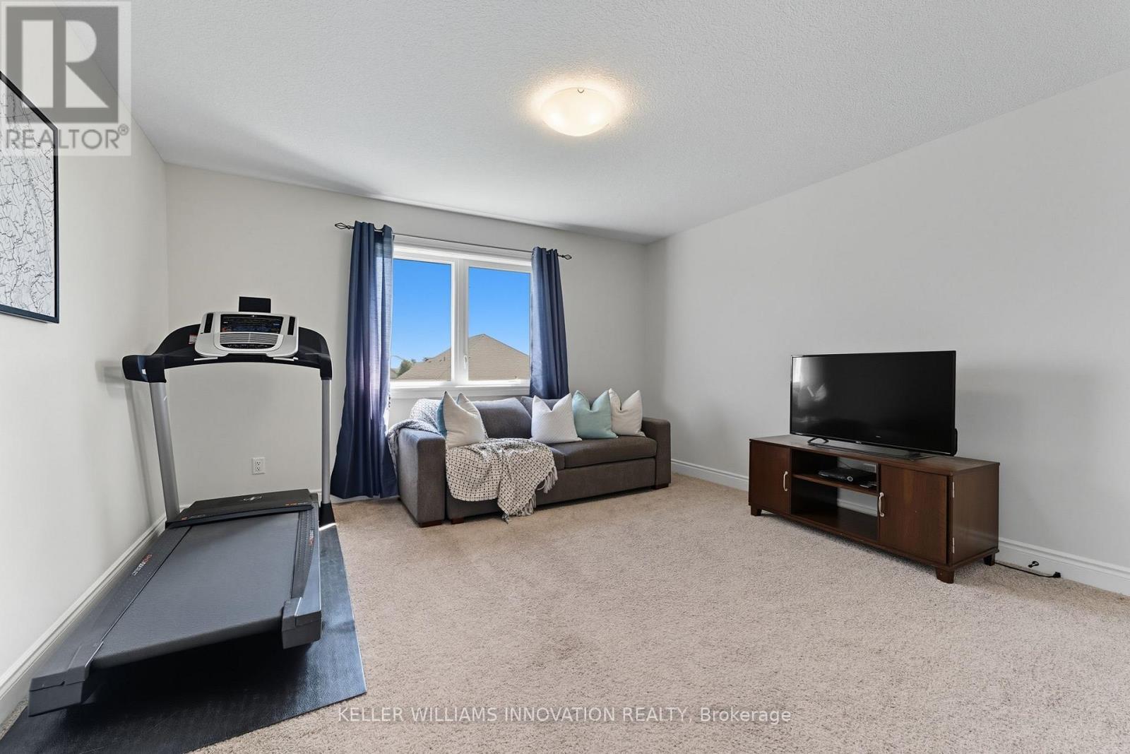 97 Forbes Crescent, North Perth, ON - Indoor Photo Showing Gym Room