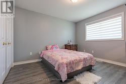 Bedroom w/laminate floors -