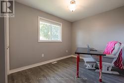 Bedroom w/laminate floors -