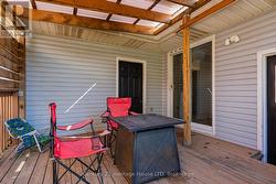 Raised wood deck, covered. -