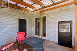 Sliding glass doors to dining/kitchen. -