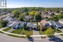 Aerial view of property and surrounding area. -