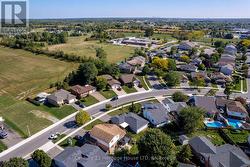 Aerial view of property and surrounding area. -