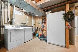 BASEMENT LAUNDRY ROOM -