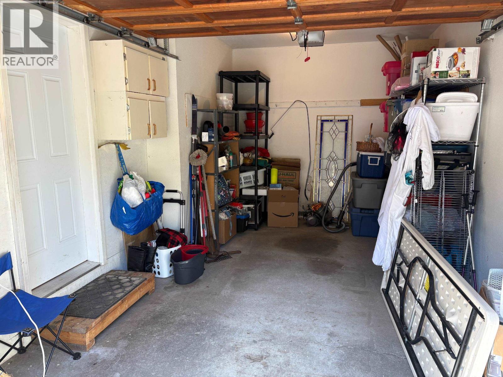 5199 Kallum Drive, 108 Mile Ranch, BC - Indoor Photo Showing Garage
