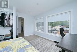 large second floor 4th bedroom with large windows -
