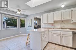 With another dining space located in the kitchen -