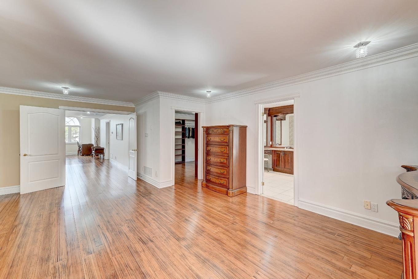 Chambre à coucher principale - 136 Rue Jean-De Ronceray, Carignan, QC - Indoor Photo Showing Other Room