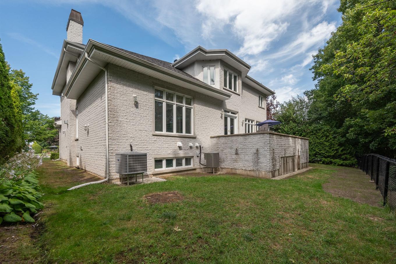 Face arrière - 136 Rue Jean-De Ronceray, Carignan, QC - Outdoor With Exterior