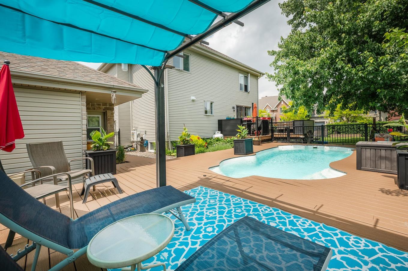 Piscine - 52 Rue De Lourtel, Saint-Jean-Sur-Richelieu, QC - Outdoor With Above Ground Pool With Deck Patio Veranda With Exterior