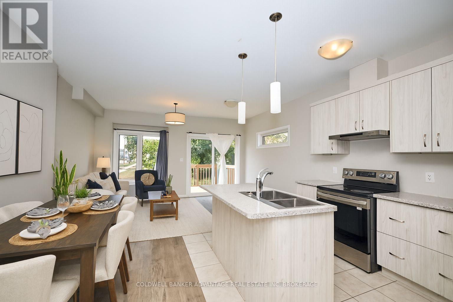 virtually staged - 324 Louise Street, Welland (Lincoln/Crowland), ON - Indoor Photo Showing Kitchen With Double Sink With Upgraded Kitchen