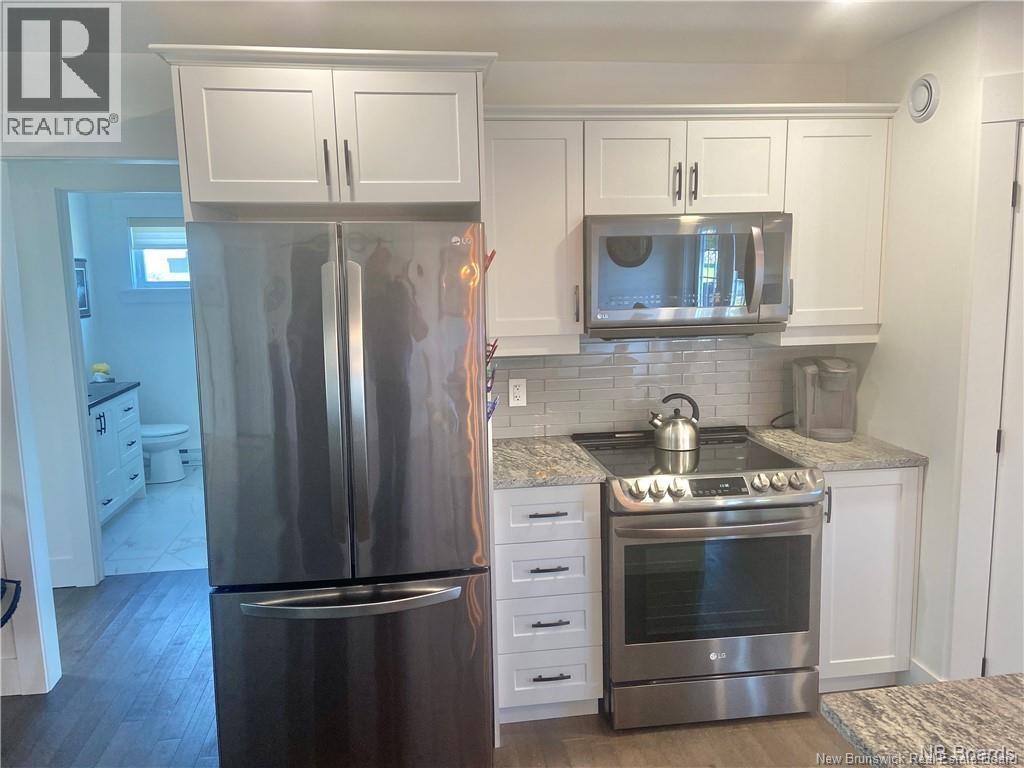 9 Flagstone Drive, Quispamsis, NB - Indoor Photo Showing Kitchen With Upgraded Kitchen