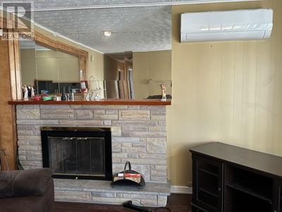 519 Main Street, Old Perlican, NL - Indoor Photo Showing Living Room With Fireplace