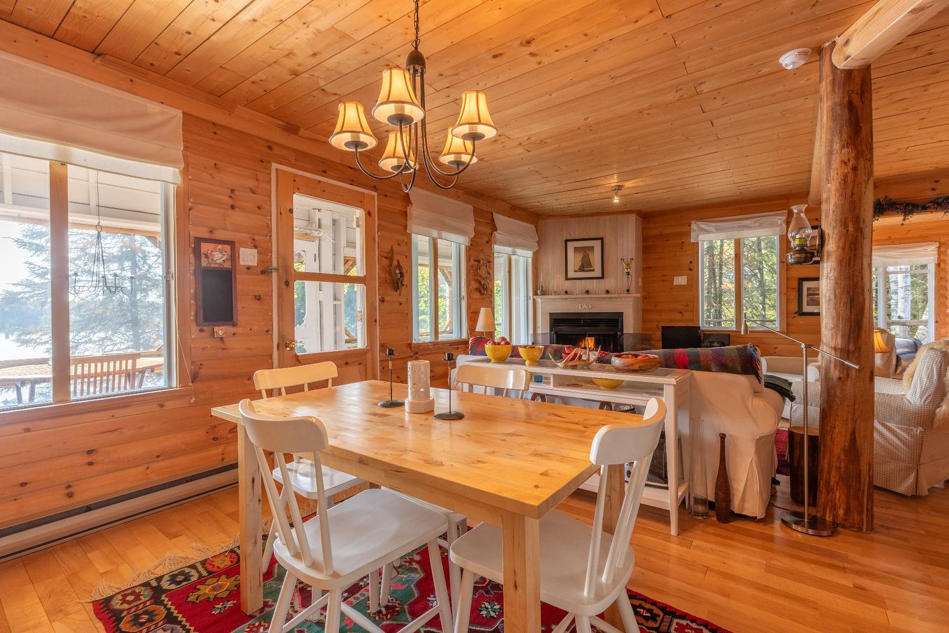 Vue d'ensemble - 1351 Ch. Kataway, Saint-Michel-Des-Saints, QC - Indoor Photo Showing Dining Room With Fireplace