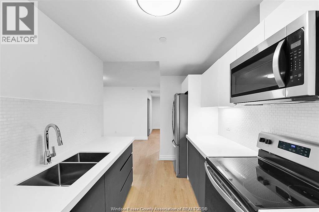 3290 Stella Crescent Unit# 604, Windsor, ON - Indoor Photo Showing Kitchen With Stainless Steel Kitchen With Double Sink With Upgraded Kitchen