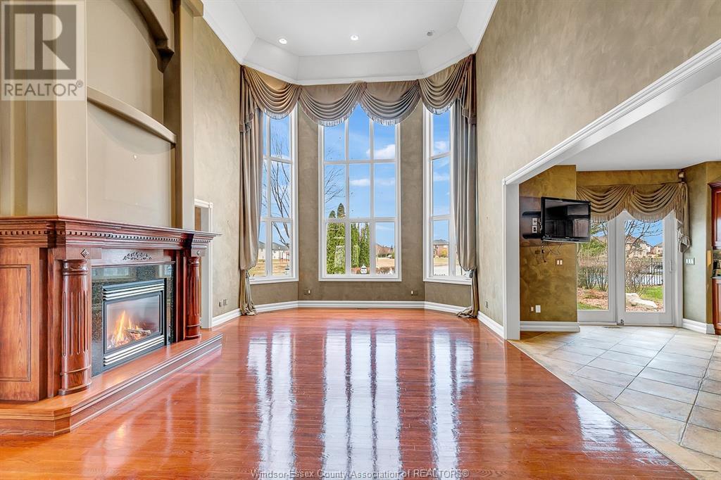 1585 Stoneybrook Crescent, Windsor, ON - Indoor Photo Showing Other Room With Fireplace