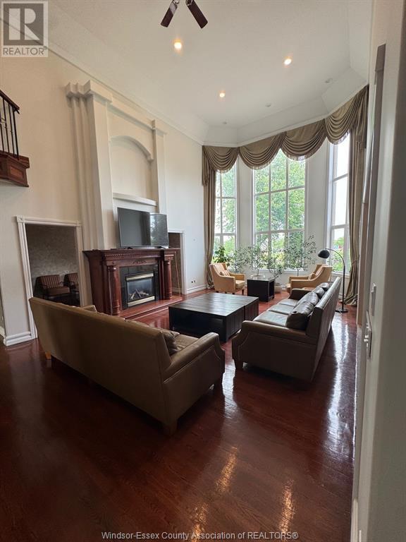 1585 Stoneybrook Crescent, Windsor, ON - Indoor Photo Showing Living Room With Fireplace