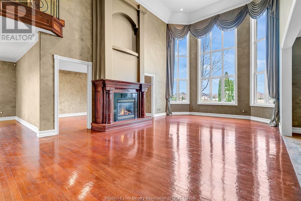 1585 Stoneybrook Crescent, Windsor, ON - Indoor Photo Showing Other Room With Fireplace