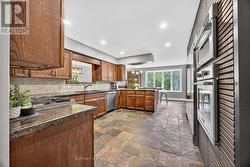 Kitchen with Built-in Stainless Steel appliances -