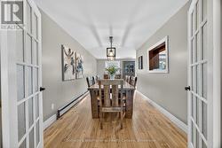 Dining room with hardwood floors -
