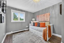 Bedroom with large closet and built-ins -