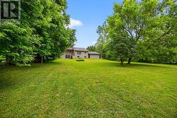 1 acre property, mature trees & no houses behind. -