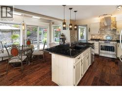 Open-concept kitchen with island & abundant storage -