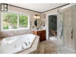 Ensuite with large soaker tub and walk in shower -