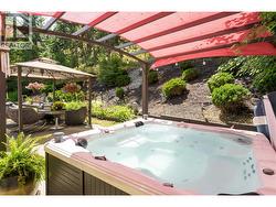 Relax year-round in your private hot tub oasis -