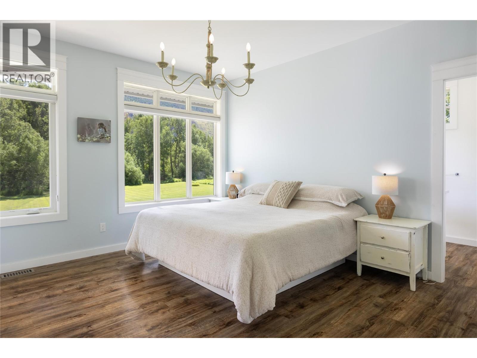Primary Bedroom - 6984 Highway 6, Coldstream, BC - Indoor Photo Showing Bedroom