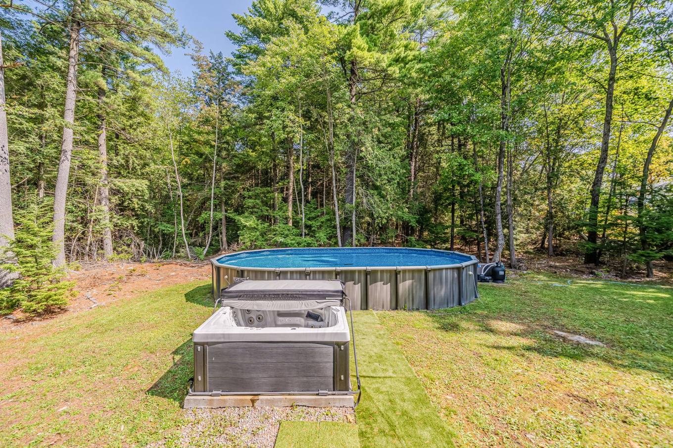 Pool - 16925 Rue Du Corail, Mirabel, QC - Outdoor With Above Ground Pool With Backyard