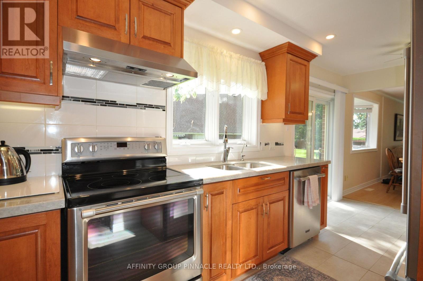 51 - 194 Cedar Beach Road, Brock (Beaverton), ON - Indoor Photo Showing Kitchen With Double Sink