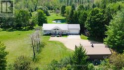 9849 Wellington Road 3. A Private Paradise! -