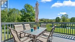 Rear Deck overlooking the Beautiful Green Space -