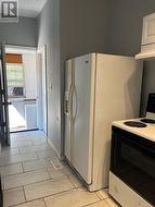 78 - Kitchen and back entrance -