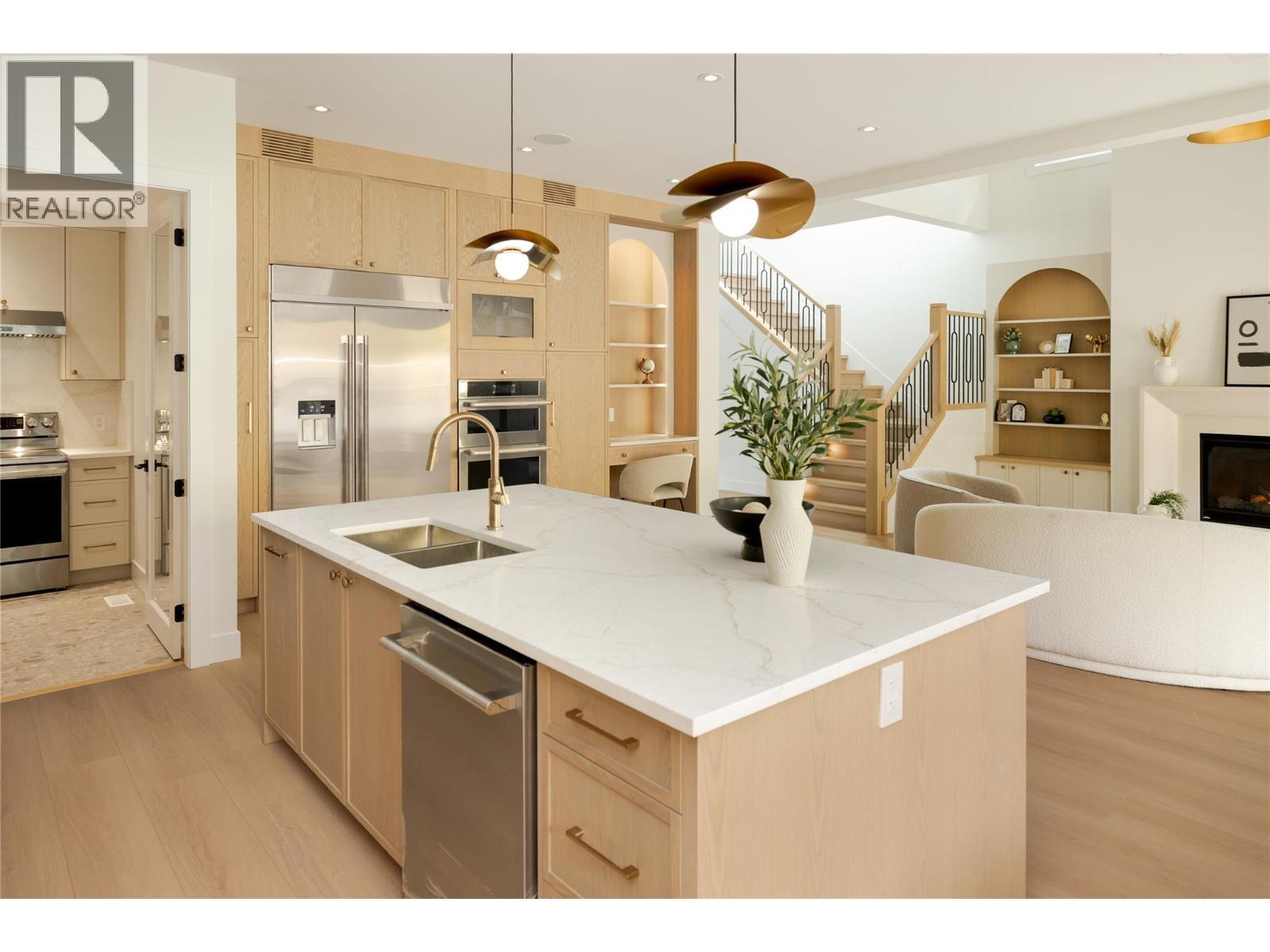 1004 Bull Crescent, Kelowna, BC - Indoor Photo Showing Kitchen With Double Sink With Upgraded Kitchen