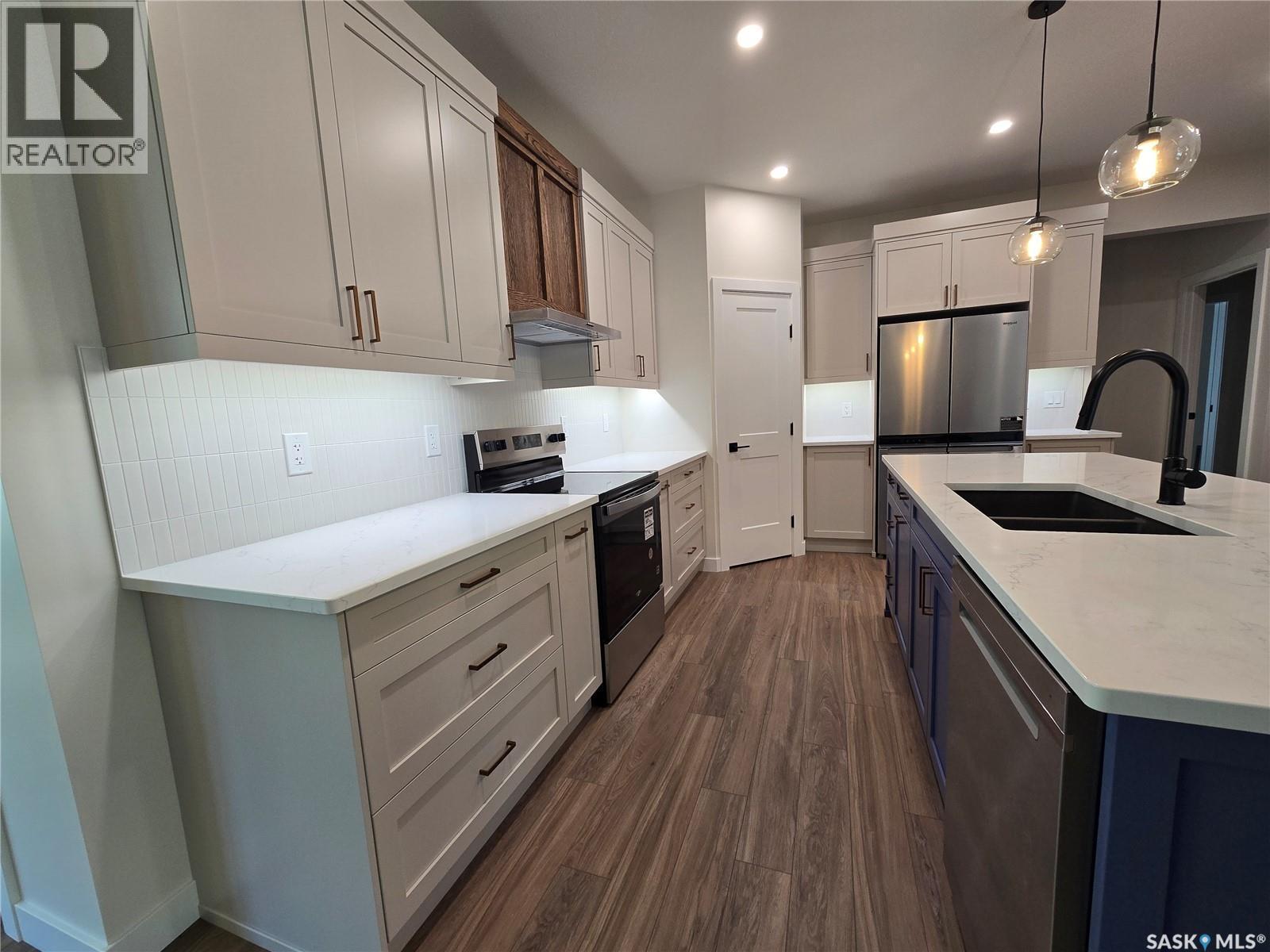 3 Kenney Crescent, Weyburn, SK - Indoor Photo Showing Kitchen With Double Sink