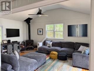 2 A22 Island, The Archipelago (Archipelago North), ON - Indoor Photo Showing Living Room With Fireplace