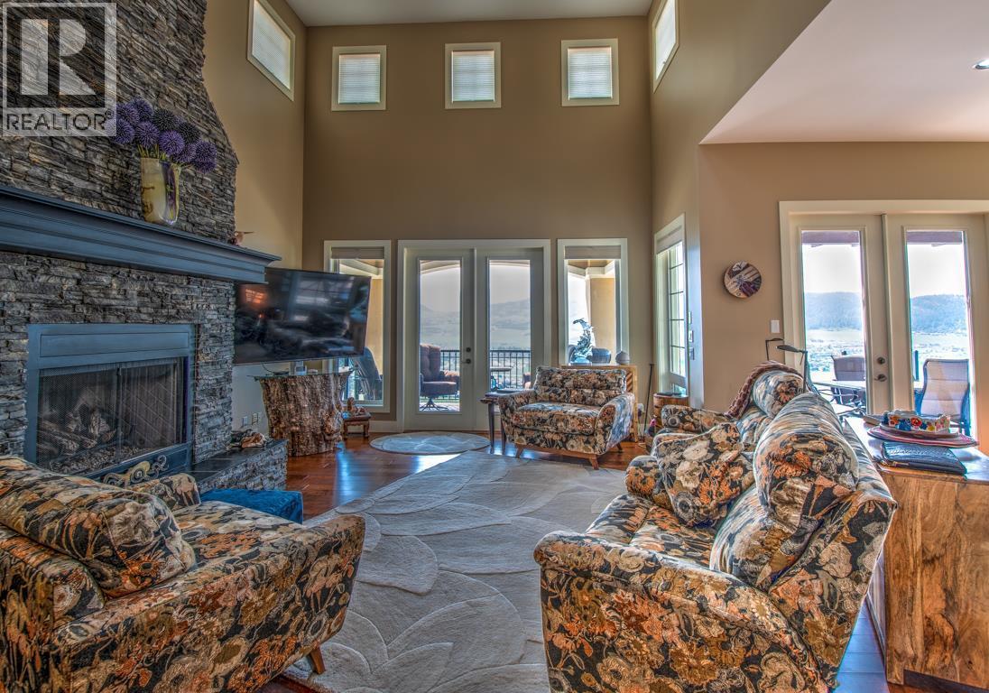 304 Cordon Place, Vernon, BC - Indoor Photo Showing Living Room With Fireplace