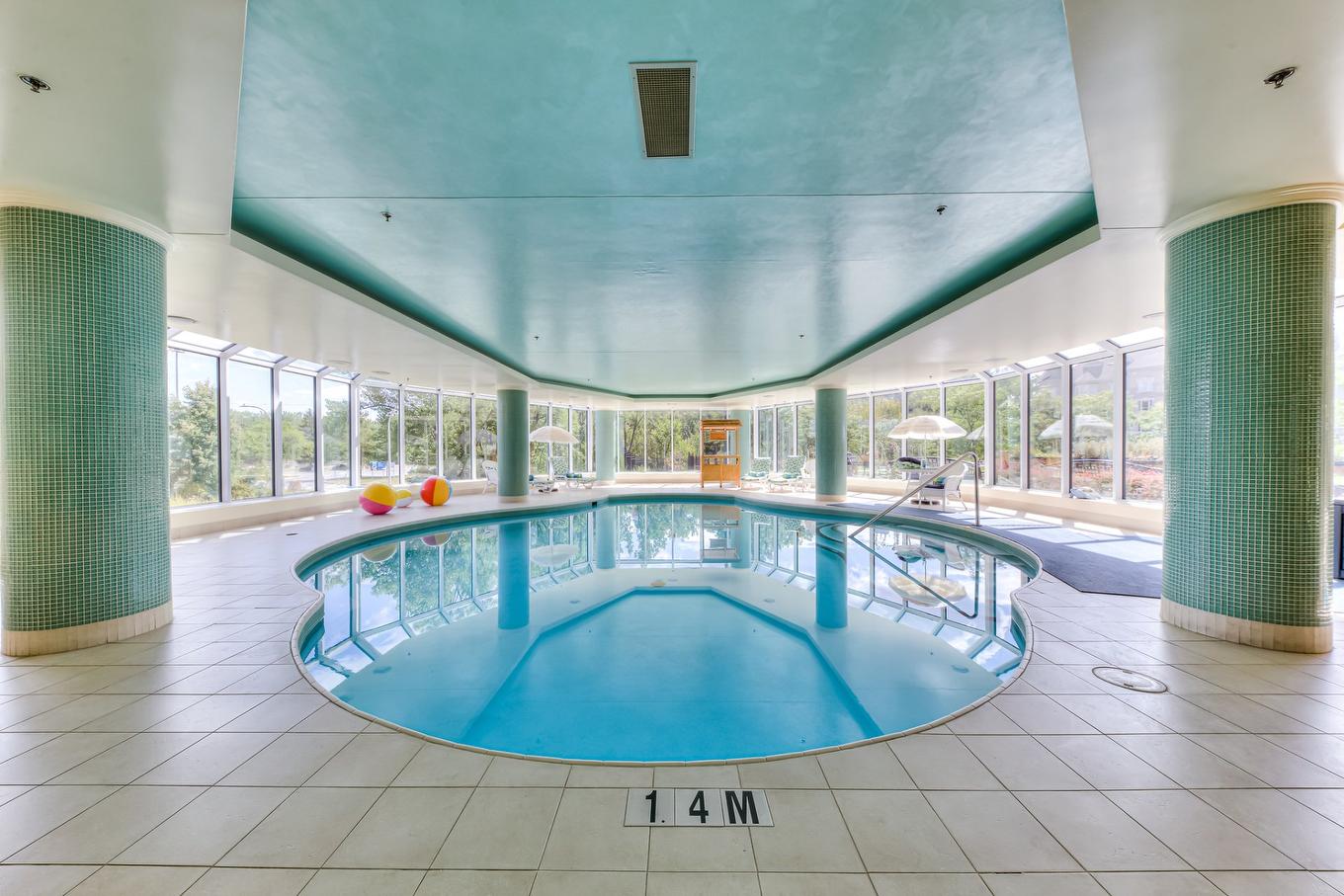 Piscine - 930-25 Prom. Des Îles, Laval (Chomedey), QC - Indoor Photo Showing Other Room With In Ground Pool