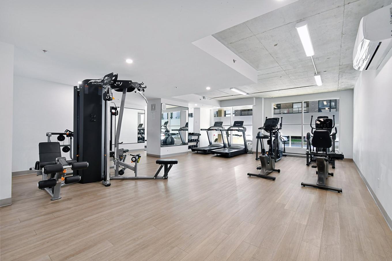 Exercise room - 211-1431 Av. De La Gare, Mascouche, QC - Indoor Photo Showing Gym Room