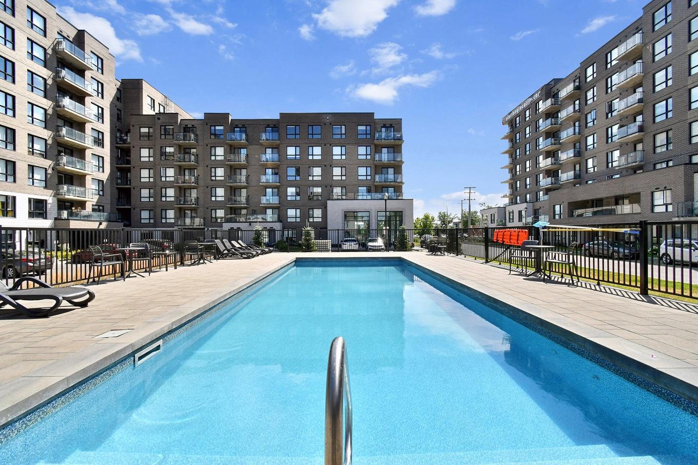 Pool - 211-1431 Av. De La Gare, Mascouche, QC - Outdoor With In Ground Pool