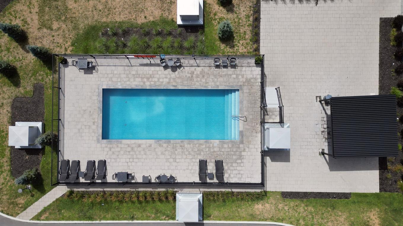 Aerial photo - 211-1431 Av. De La Gare, Mascouche, QC - Outdoor With In Ground Pool